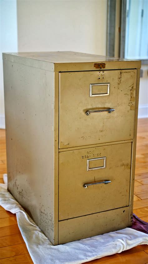 gluing fabric to metal file cabinet|covering a metal filing cabinet.